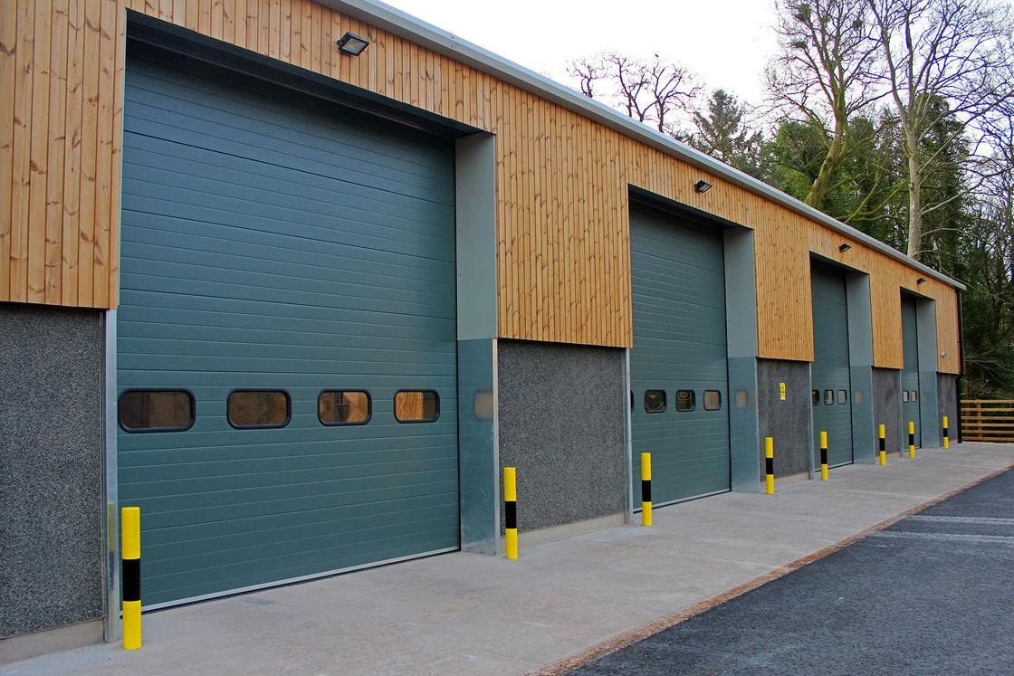 Commercial overhead doors installed across multiple service bays